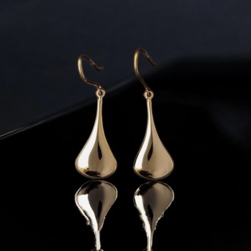 Opulent gold teardrop earrings