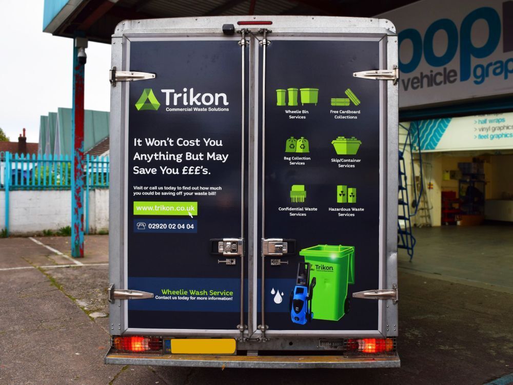 Rear van wrap on company Renault Master van.