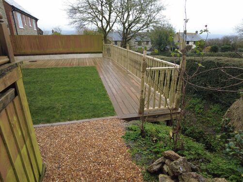 A wooden decking looking out over the countryside. Landscapers in Dorchester