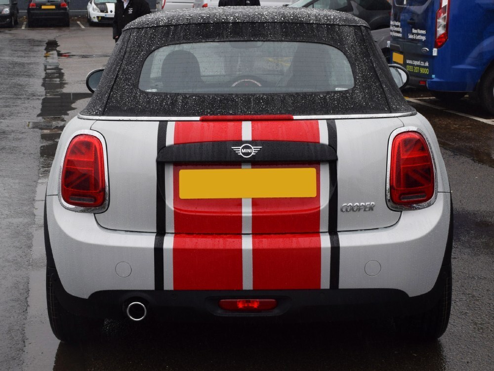Red and black sport stripe graphics on white Mini Cooper