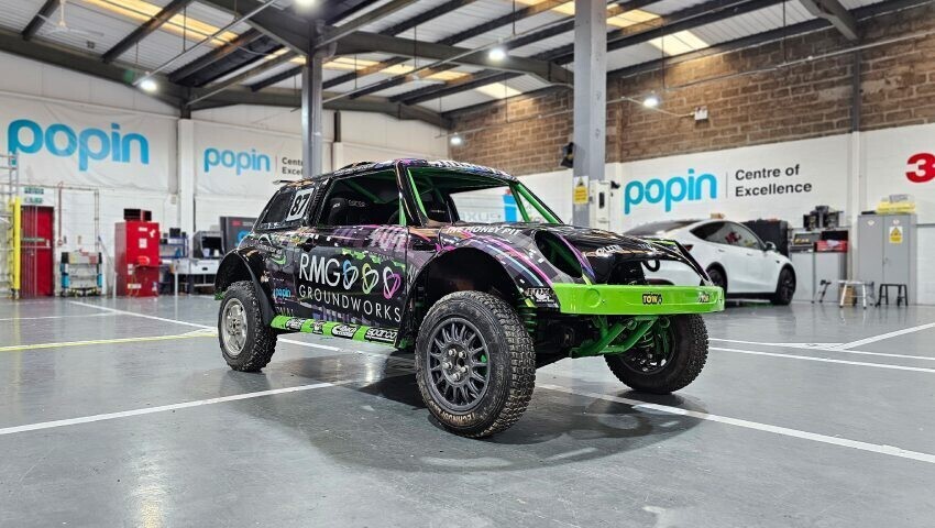 Mini Cooper V6 rally car with new livery installation at Popin Graphics vehicle wrap centre in Cardiff.