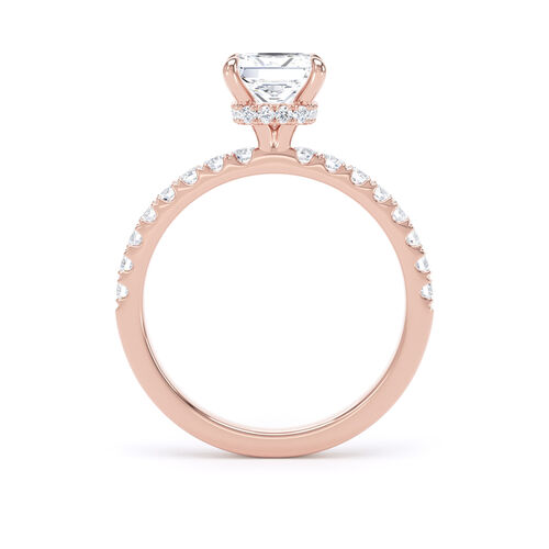 Princess cut solitaire with diamond shoulders and hidden halo