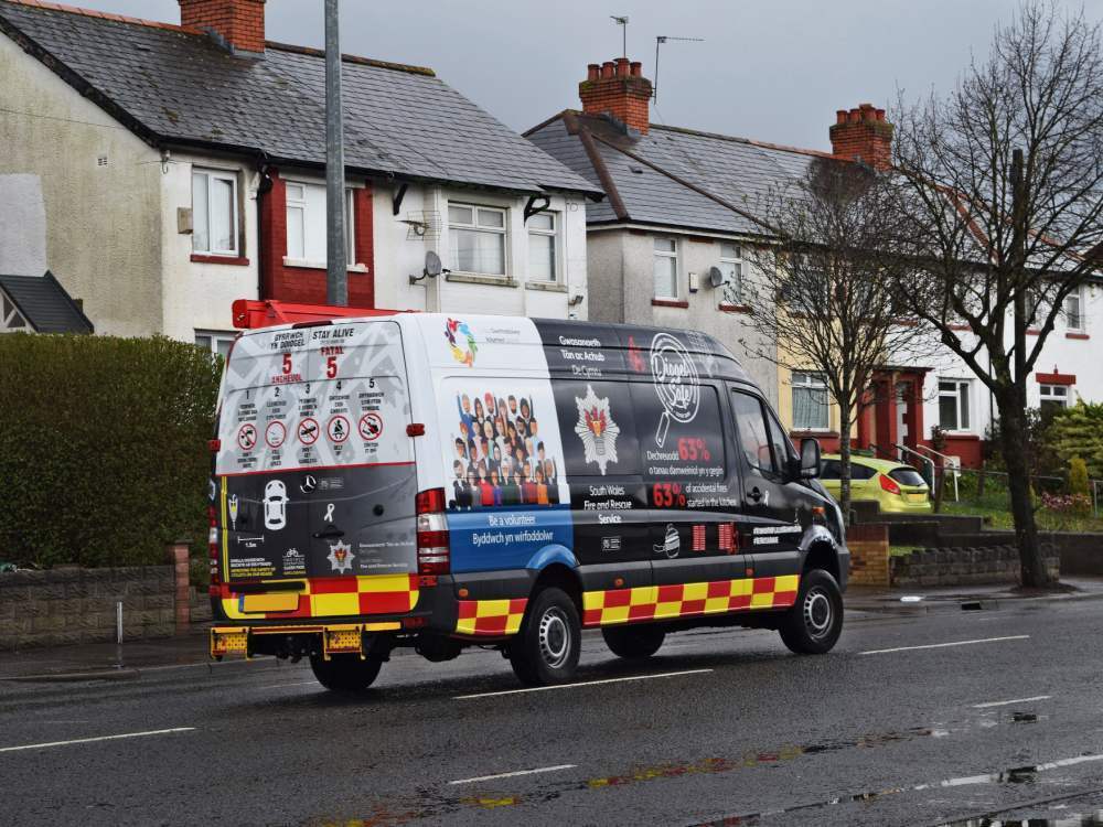 South Wales Fire emergency vehicle wrap on Mercedes Sprinter van.