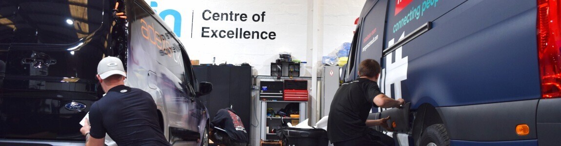 Vehicle wrap installers at work