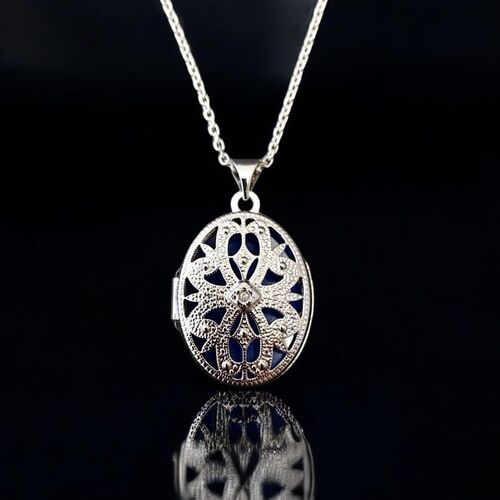 Diamond set filigree locket