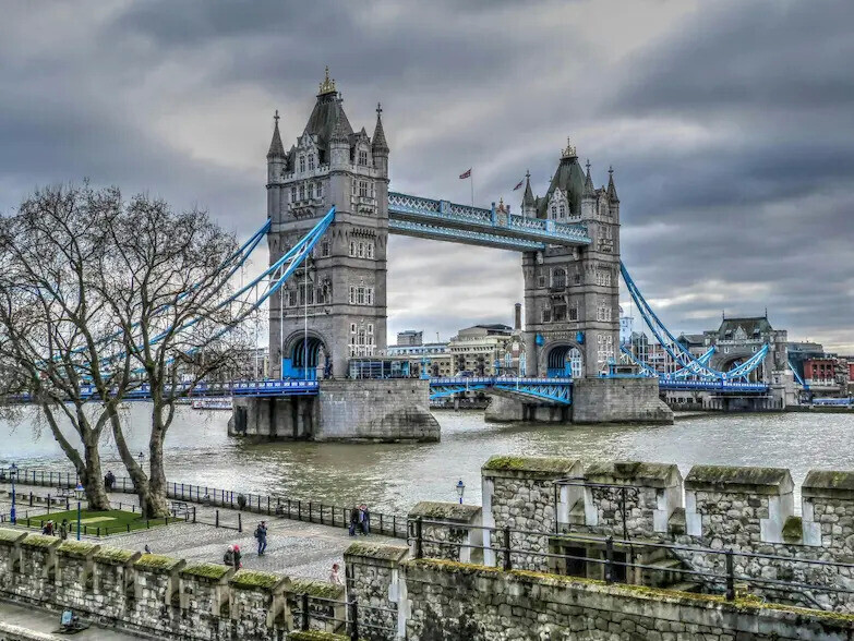 Tower Bridge in London featured above FAQ section for local physiotherapy services