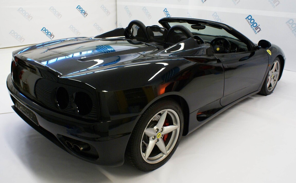 Black Ferrari 360 Spider before car wrap installation at Popin in Cardiff.