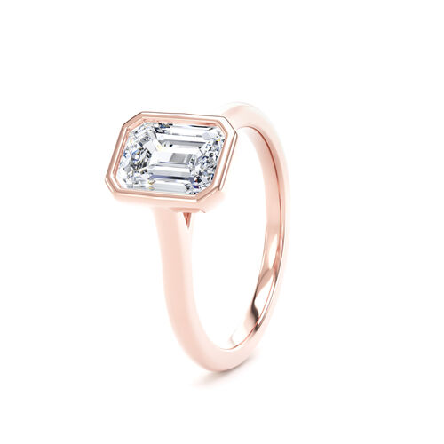 Emerald cut rubover diamond solitaire