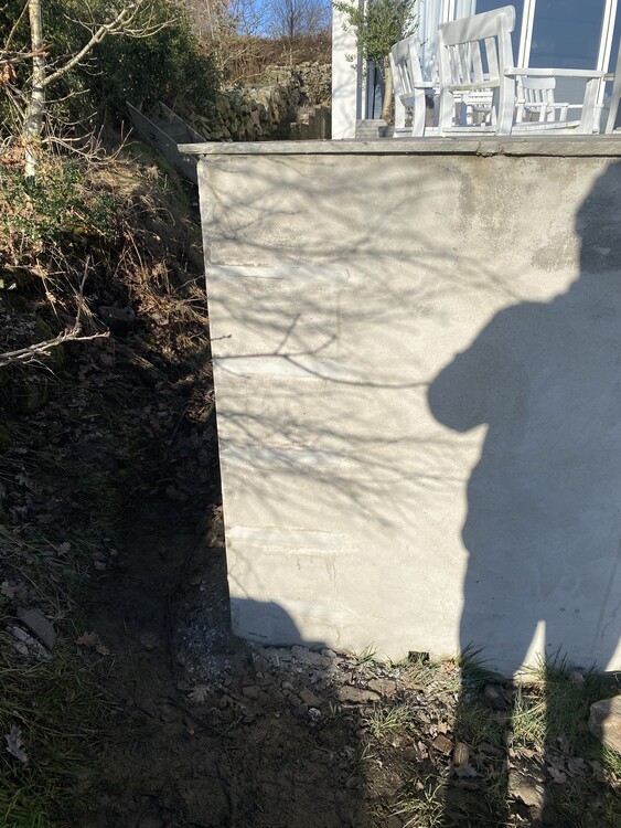 Retaining Wall crack  masonry repair using helical bars.