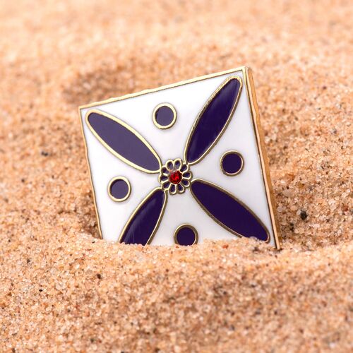 Badge. The Persian Cross. Purple Cross on White with Central Red stone.