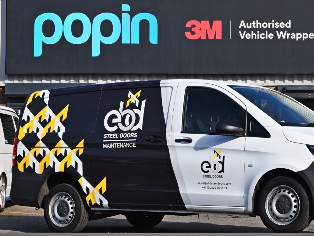 Partial vehicle wrap on company Mercedes Vito van outside Popin in Cardiff.