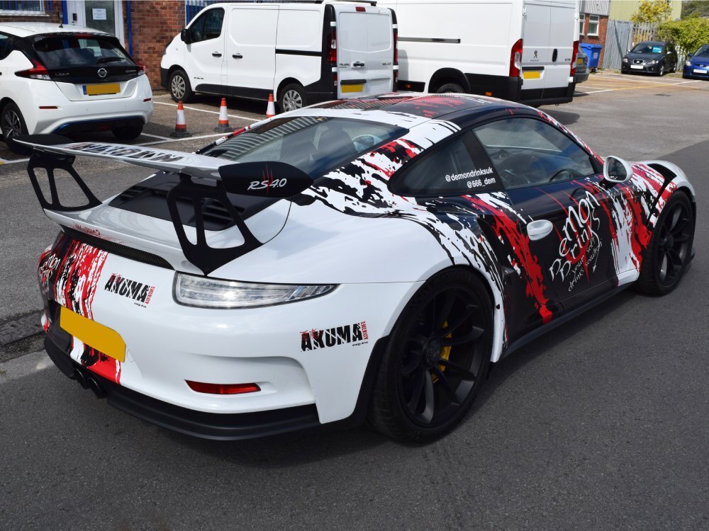 Motorsport wrap and graphics on a white Porsche GT3 RS