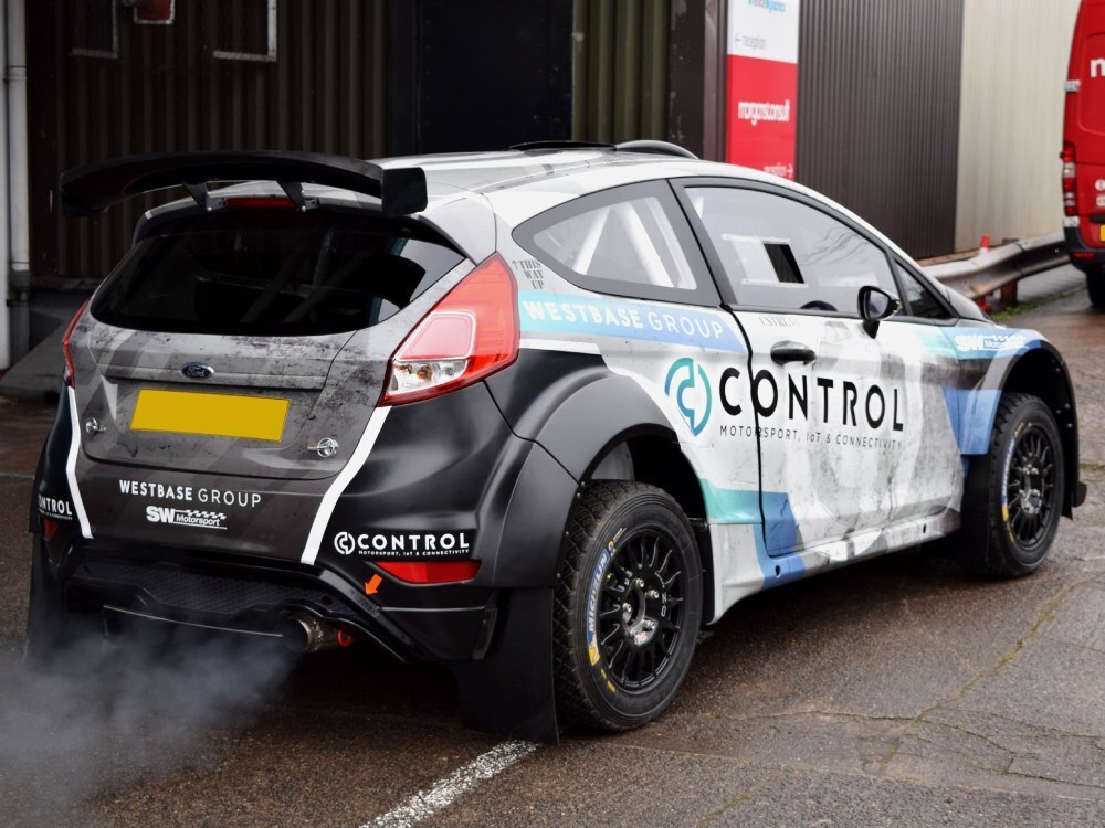 Motorsport livery and graphics on a Ford Fiesta R5 rally car
