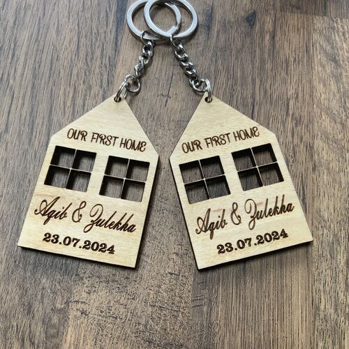“New Home” keyring pair