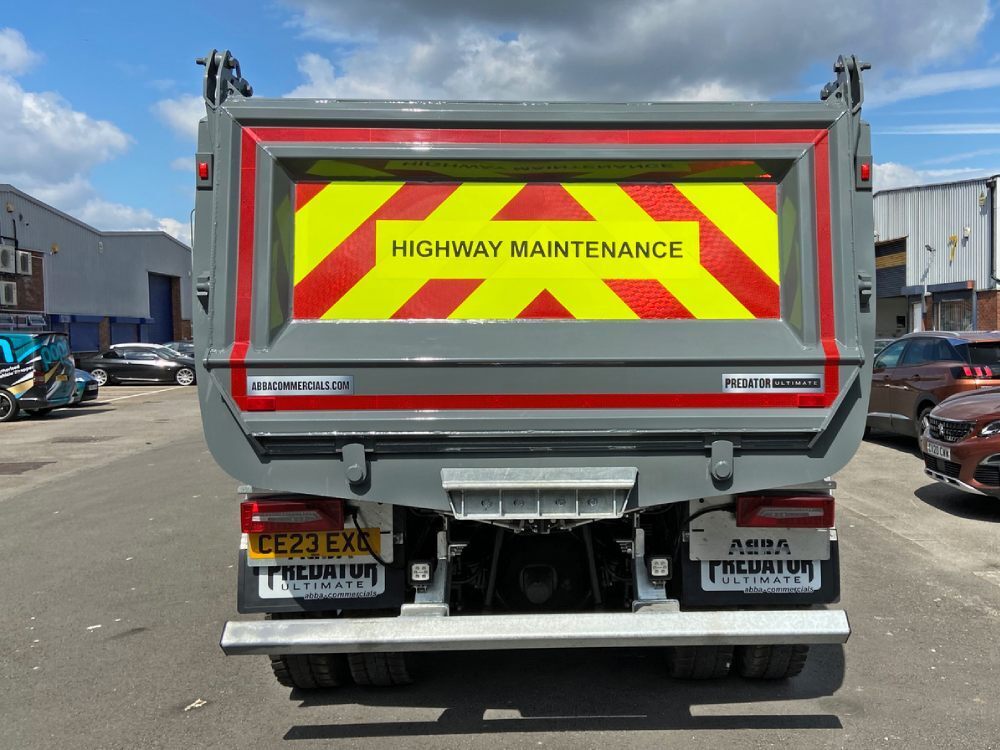 Chevron graphics on the back of a Scania truck.