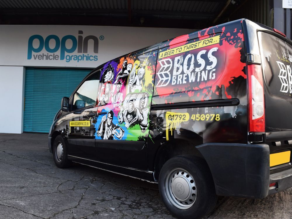 Full branded vehicle livery with bold design on a Citroen Dispatch company van.