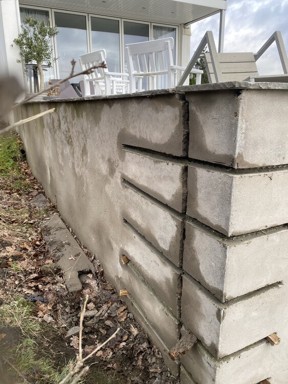 Retaining Wall crack  masonry repair using helical bars.