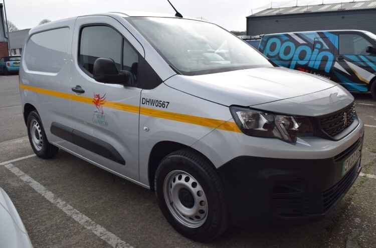 Calendered vinyl vehicle graphics on a Cardiff Council business van