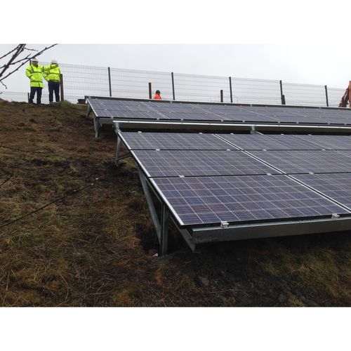 Secure fixing for ground mounted solar panels