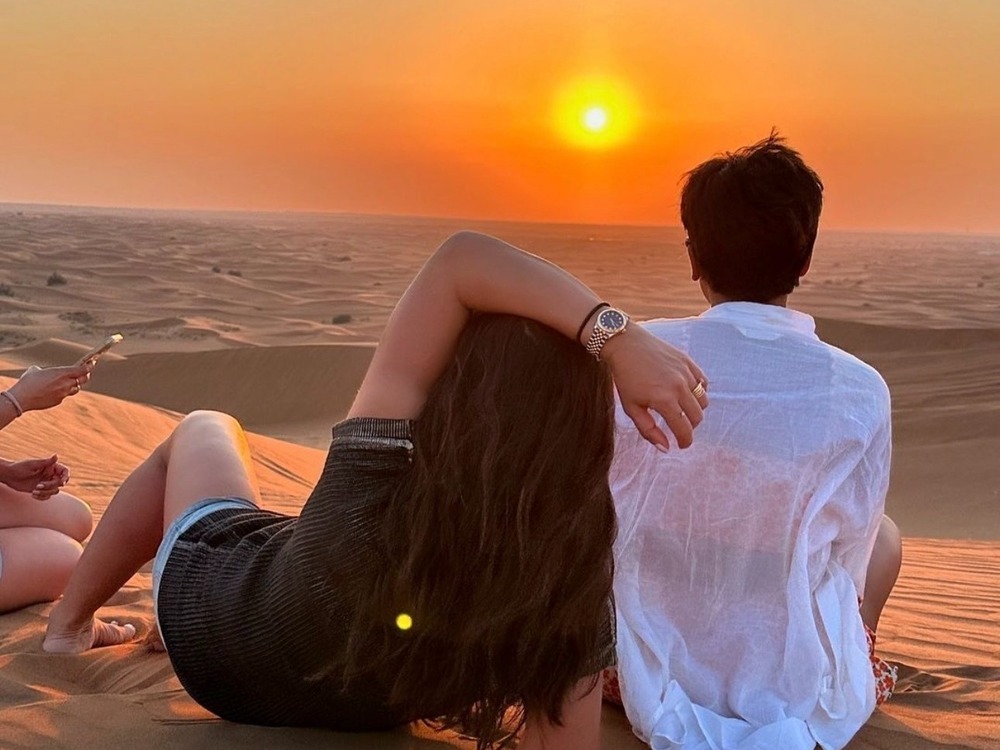 Evening red dunes, desert Safari with Dune bashing Camel ride sand boarding sunset photography barbecue dinner live authentic shows belly dancing fire show & Much More