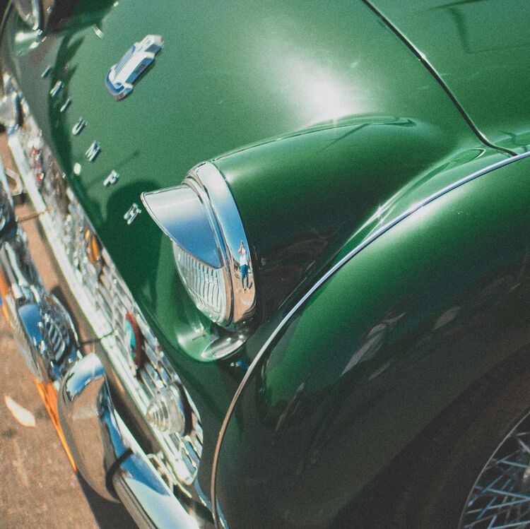An old triumph race car painted in British Racing Green colour