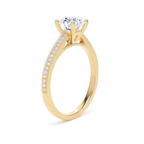 Round brilliant solitaire with mille-grain diamond set shoulders