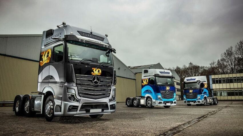 Fleet of trucks with new vehicle wraps and vinyl graphics