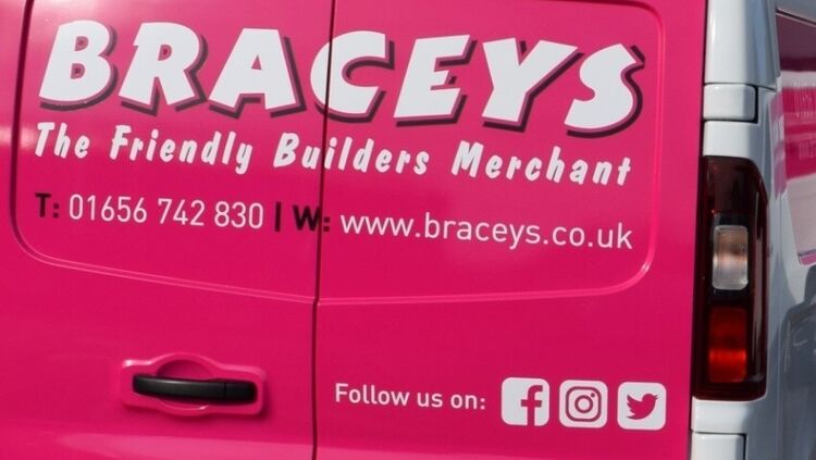 Social media icons incorporated into van vehicle graphics design.