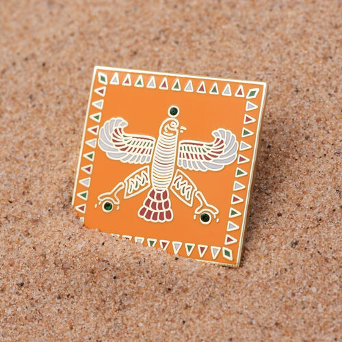 Badge. The Persian Falcon. Deep Orange with 3 Green Stones.