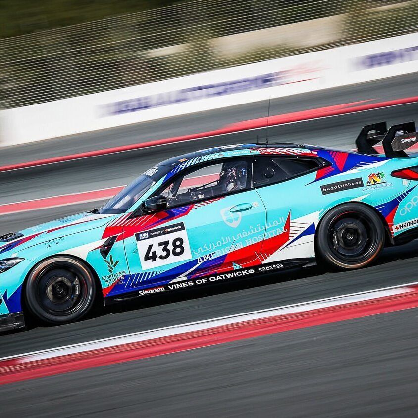 Motorsport livery on a BMW M4 GT4 race car