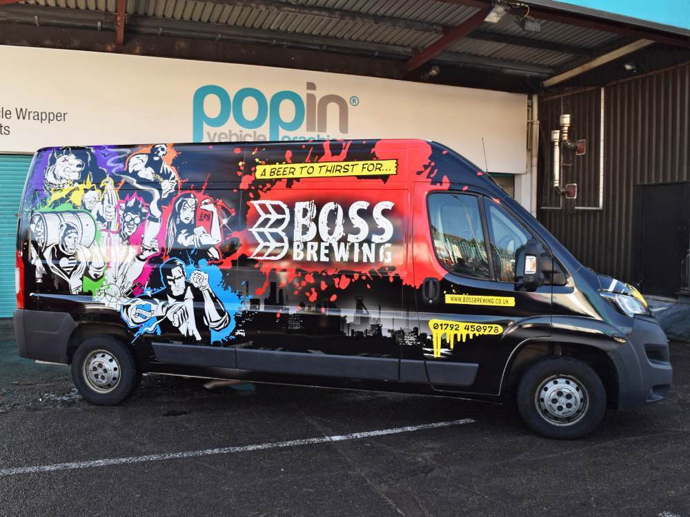 Colourful branded van wrap on company Peugeot Boxer.