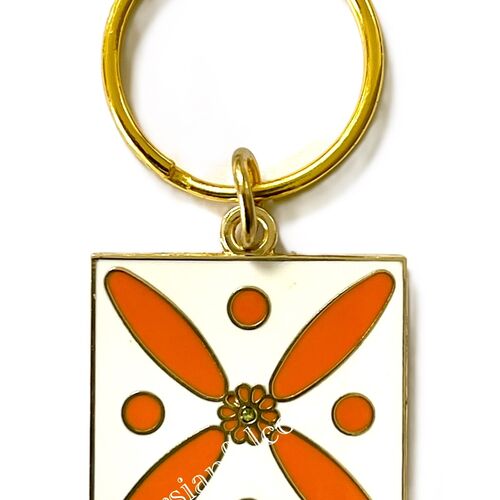 Charm. The Persian Cross. Orange on White with 1 Central Green Stone.