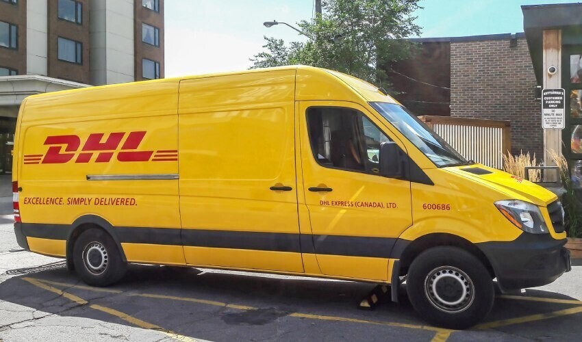 DHL delivery van with yellow and red livery.