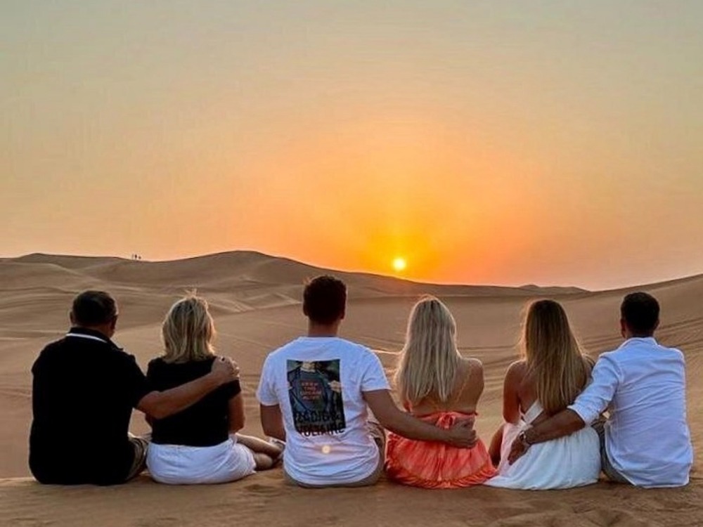 Evening red dunes, desert Safari with Dune bashing Camel ride sand boarding sunset photography barbecue dinner live authentic shows belly dancing fire show & Much More