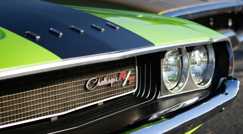 Motorsport stripe graphics on a green classic 1970 Dodge Challenger R/T