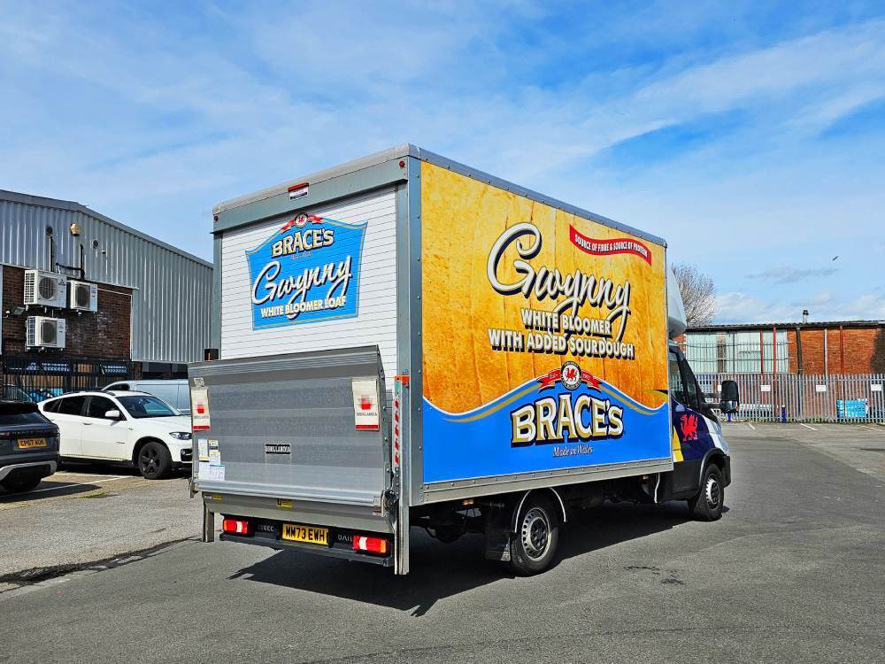 Company branded Brace's Bread vehicle wrap on the side and rear of an Iveco Daily Luton Box van.