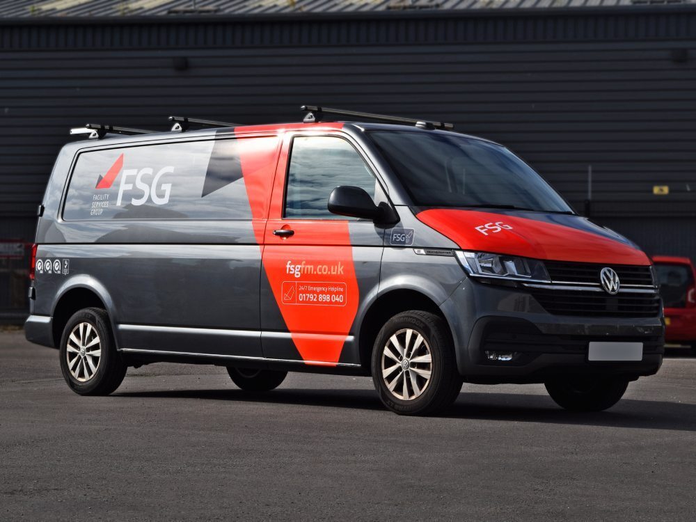 Volkswagen Transporter van with vehicle wrap and graphics.