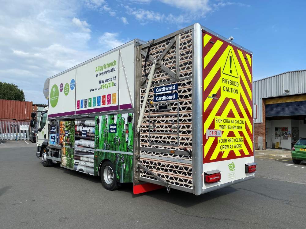 DAAF recycling truck with vinyl wrap and reflective chevron safety graphics