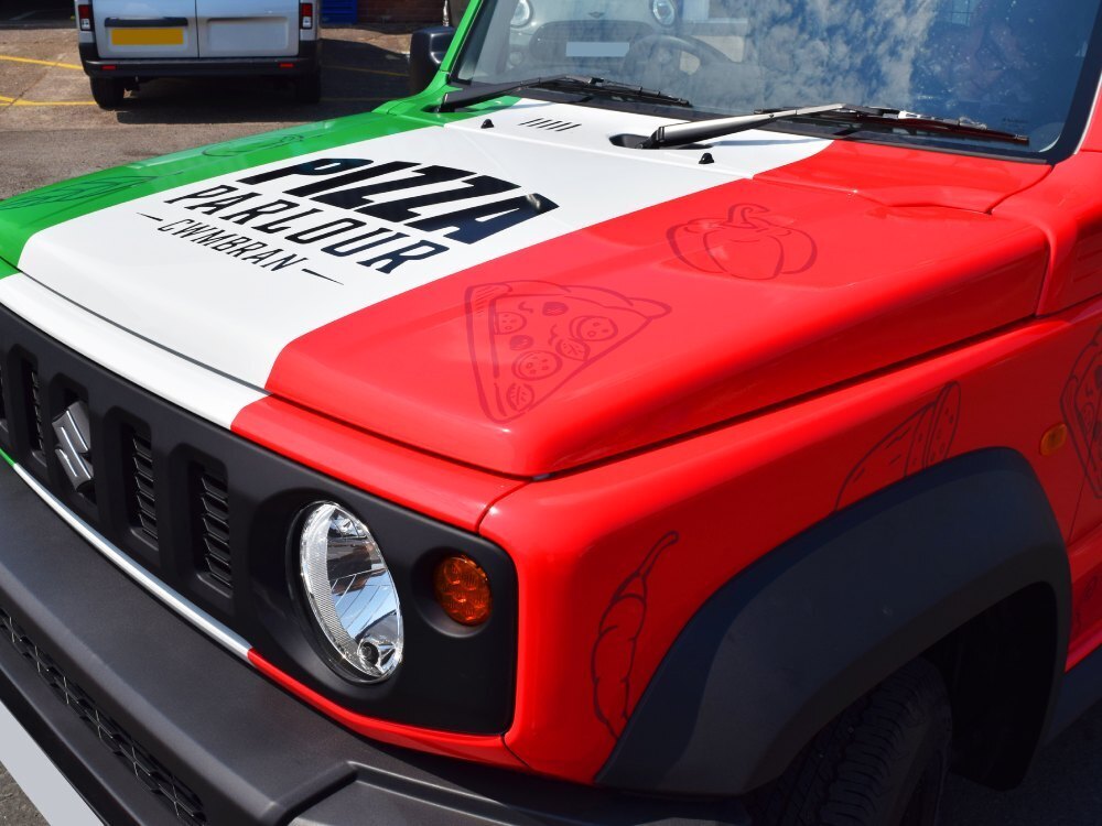Italian themed vehicle wrap and business branded graphics on Pizza Parlour Suzuki Jimny.