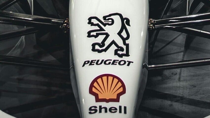 Peugeot motorsport logo graphic on formula one race car