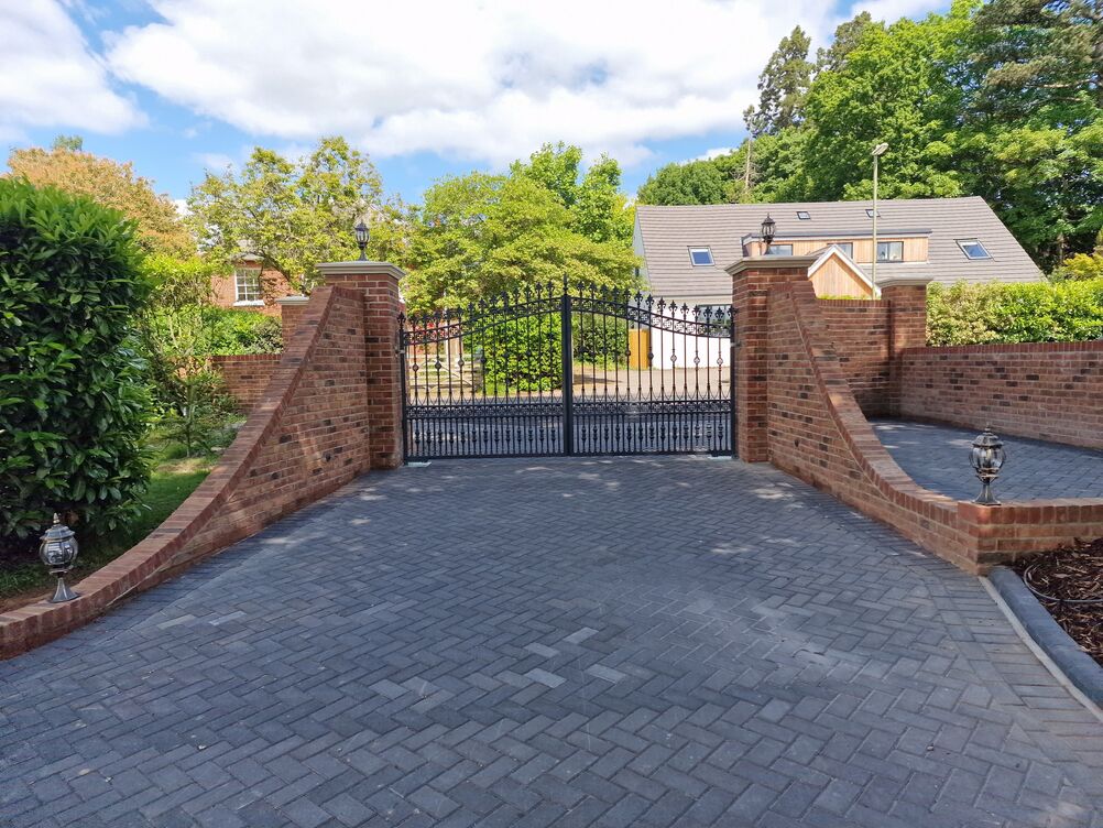 150 metre Boundary Brickwork Wall and 285 sqm Block Paving. Special piling and steelwork design provisions taken to protect TPO tree roots.