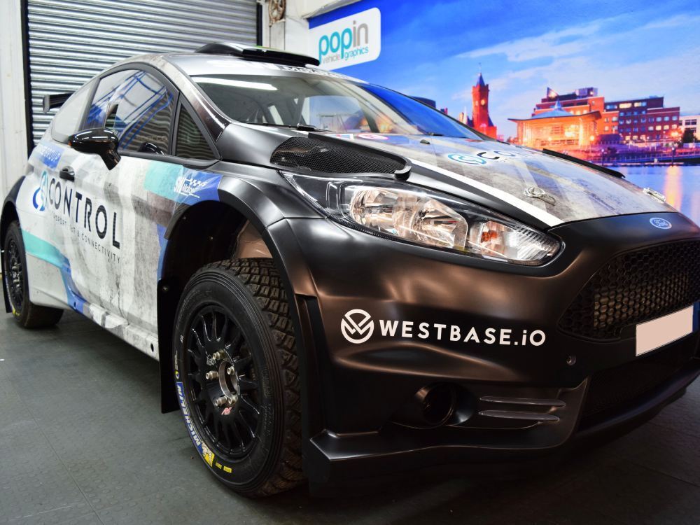 Commercial car wrap on Ford Fiesta R5 company car.