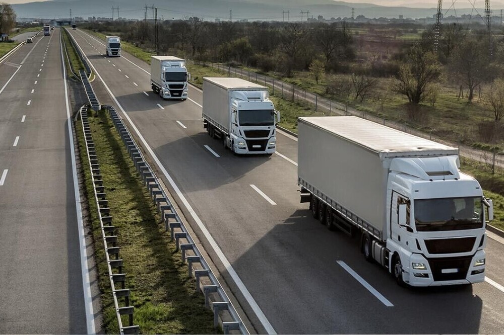 Lorries transporting meat deliveries on the motorway