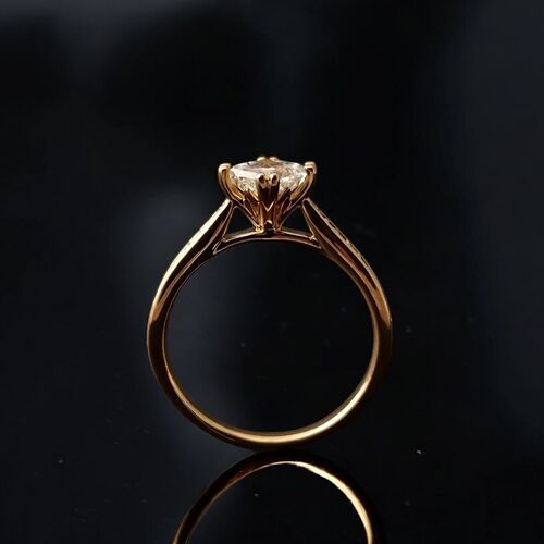 Princess cut double claw solitaire with diamond set shoulders 