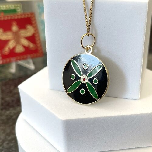 Round Pendant. The Persian Cross. White on Green  with 1 Central Red Stone.
