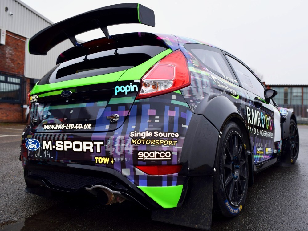 Motorsport graphics installed on a Ford Fiesta R5 race car