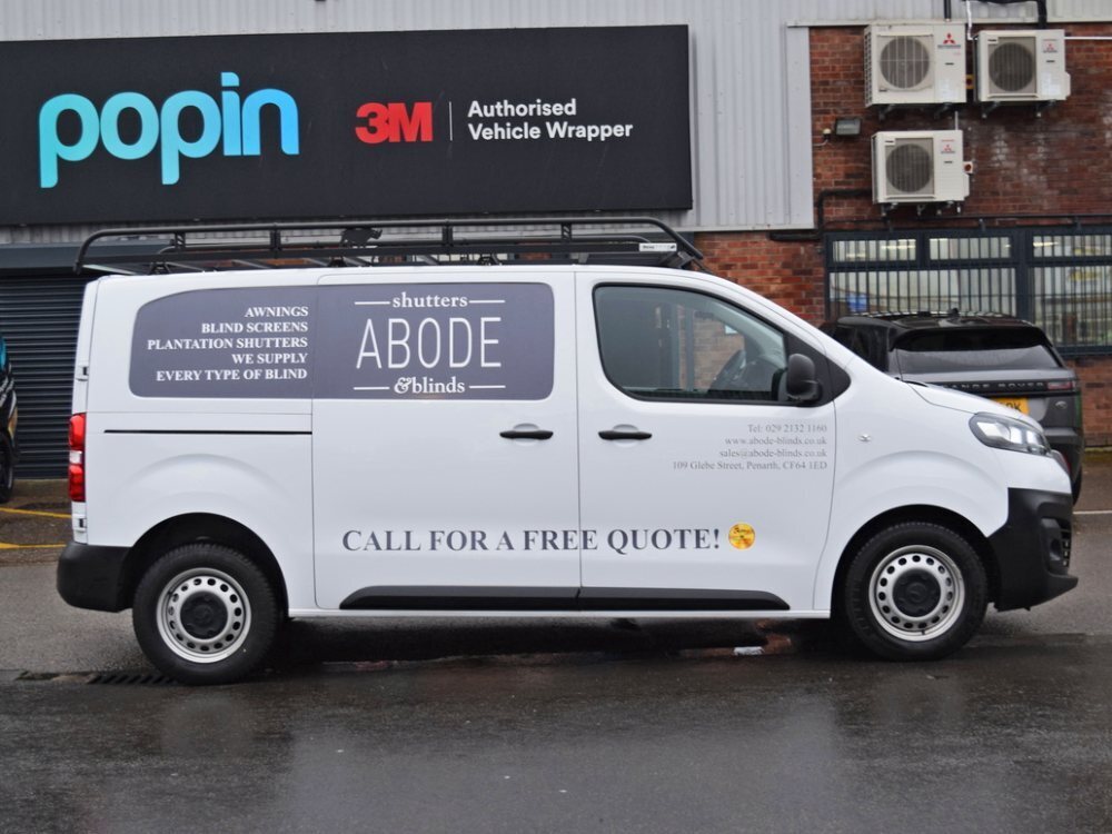 Van graphics on white company Vauxhall Vivaro outside Popin wrap facilities in Cardiff.