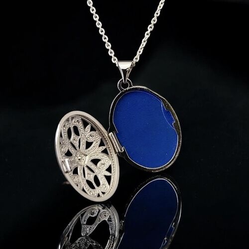 Diamond set filigree locket