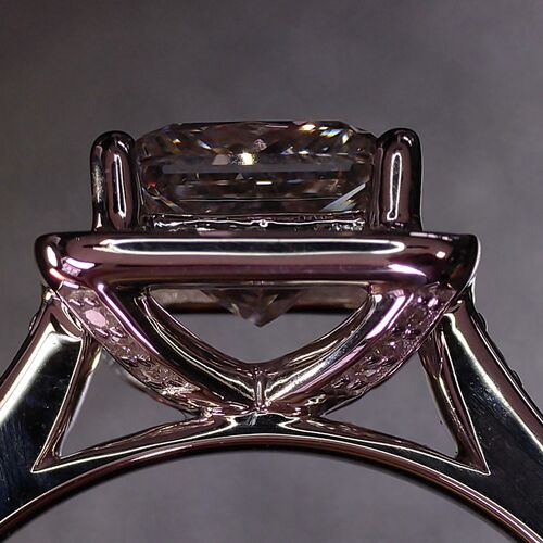 Princess cut halo with diamond set shoulders