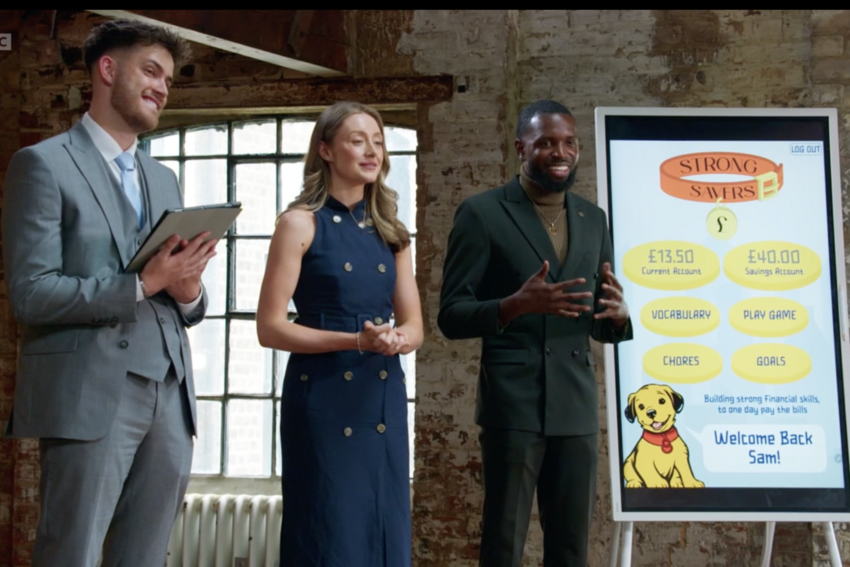 three people standing in front of a presentation board showing the app from the apprentice.